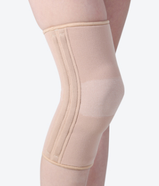 Knee support with silicone pad